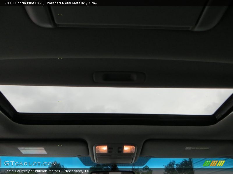 Polished Metal Metallic / Gray 2010 Honda Pilot EX-L