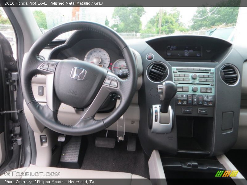 Polished Metal Metallic / Gray 2010 Honda Pilot EX-L