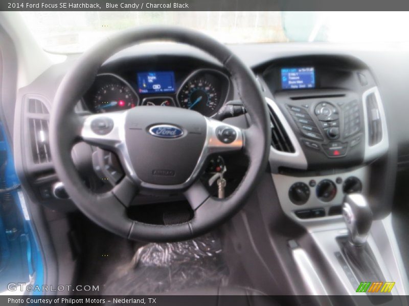 Blue Candy / Charcoal Black 2014 Ford Focus SE Hatchback