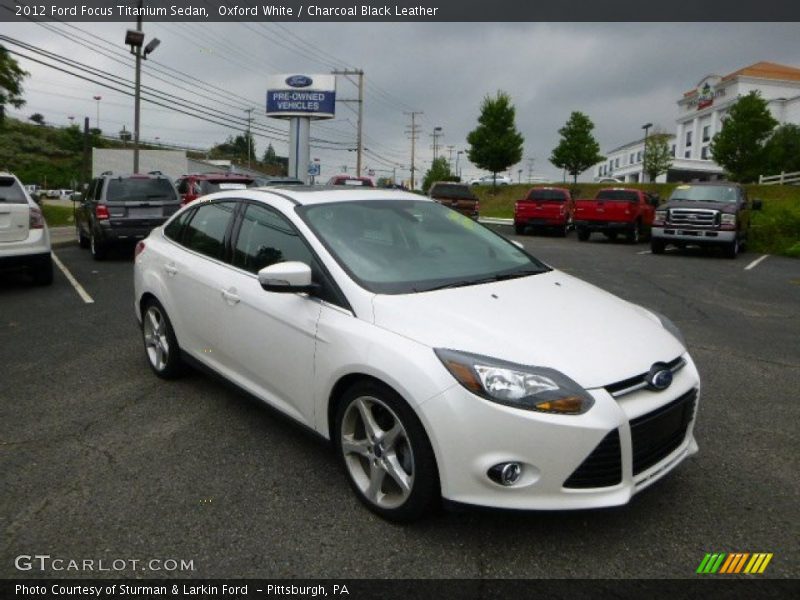 Oxford White / Charcoal Black Leather 2012 Ford Focus Titanium Sedan