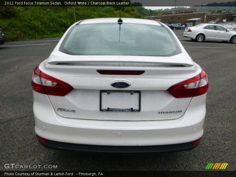 Oxford White / Charcoal Black Leather 2012 Ford Focus Titanium Sedan