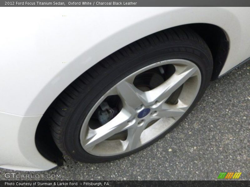 Oxford White / Charcoal Black Leather 2012 Ford Focus Titanium Sedan
