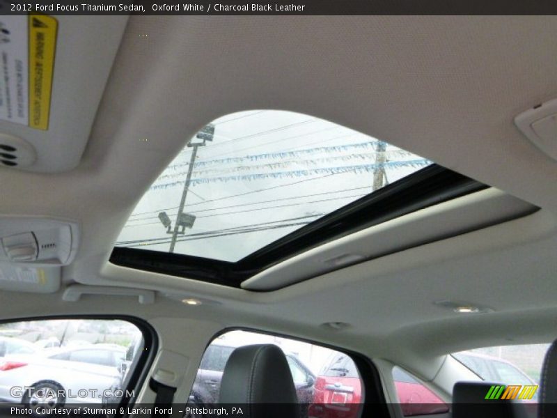 Oxford White / Charcoal Black Leather 2012 Ford Focus Titanium Sedan