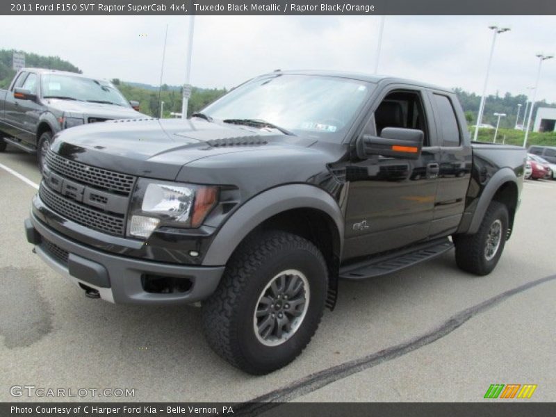 Front 3/4 View of 2011 F150 SVT Raptor SuperCab 4x4