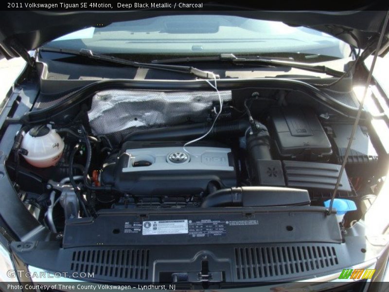 Deep Black Metallic / Charcoal 2011 Volkswagen Tiguan SE 4Motion