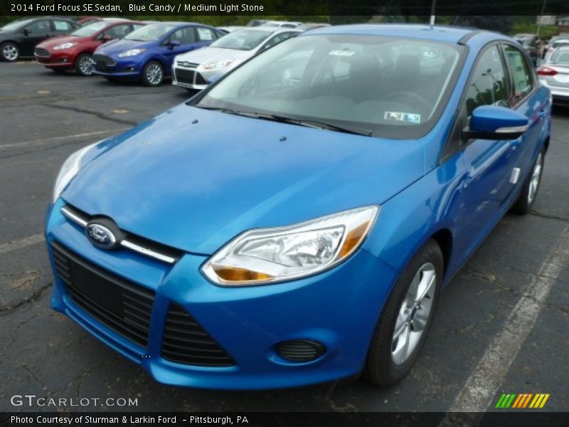 Blue Candy / Medium Light Stone 2014 Ford Focus SE Sedan