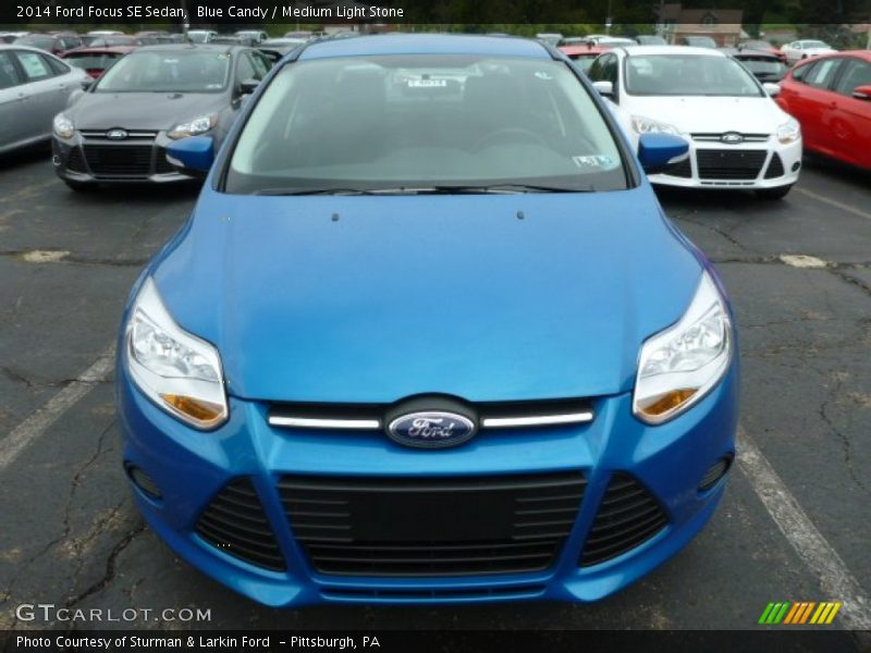 Blue Candy / Medium Light Stone 2014 Ford Focus SE Sedan