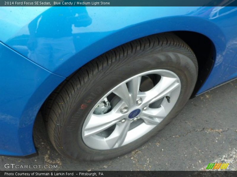 Blue Candy / Medium Light Stone 2014 Ford Focus SE Sedan