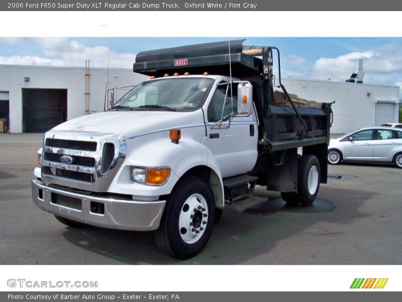 Front 3/4 View of 2006 F650 Super Duty XLT Regular Cab Dump Truck