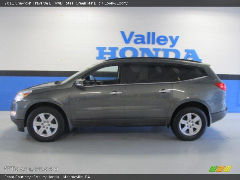 Steel Green Metallic / Ebony/Ebony 2011 Chevrolet Traverse LT AWD