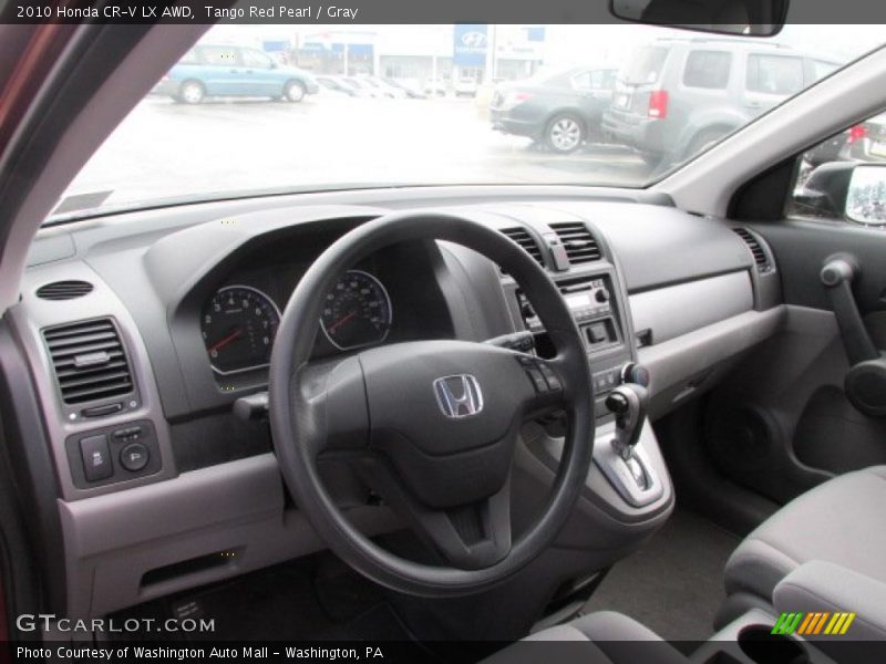 Tango Red Pearl / Gray 2010 Honda CR-V LX AWD