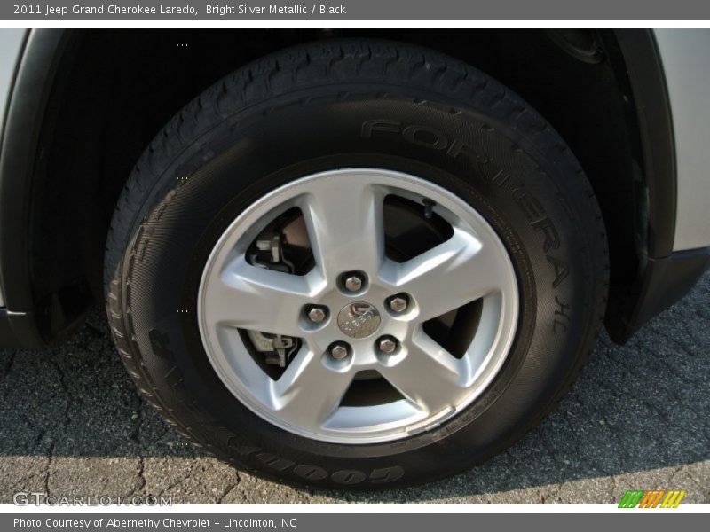 Bright Silver Metallic / Black 2011 Jeep Grand Cherokee Laredo