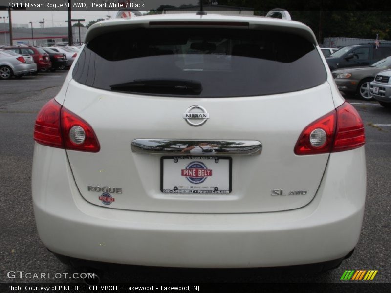 Pearl White / Black 2011 Nissan Rogue SL AWD