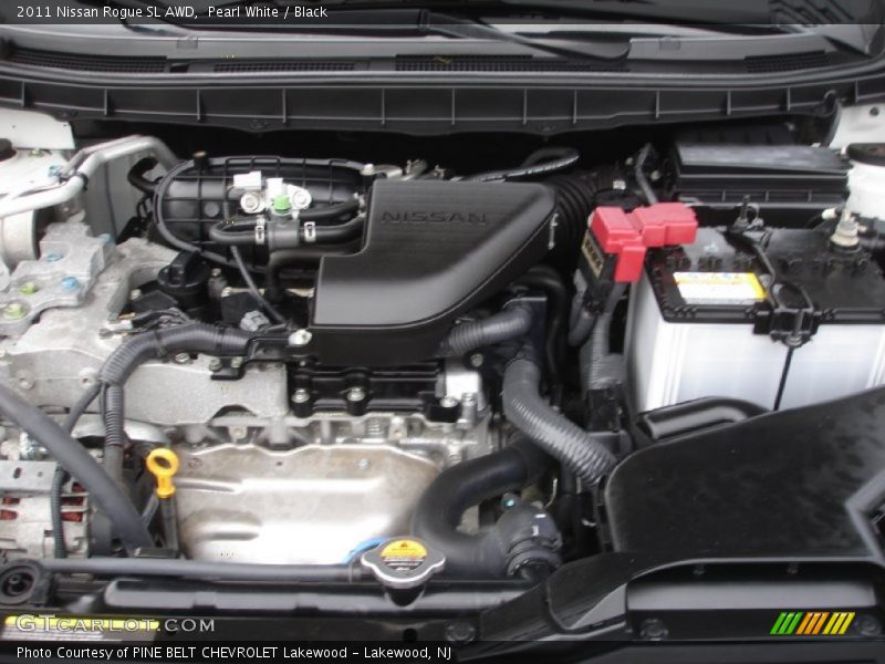 Pearl White / Black 2011 Nissan Rogue SL AWD
