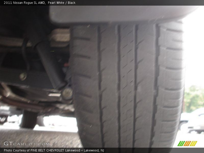 Pearl White / Black 2011 Nissan Rogue SL AWD