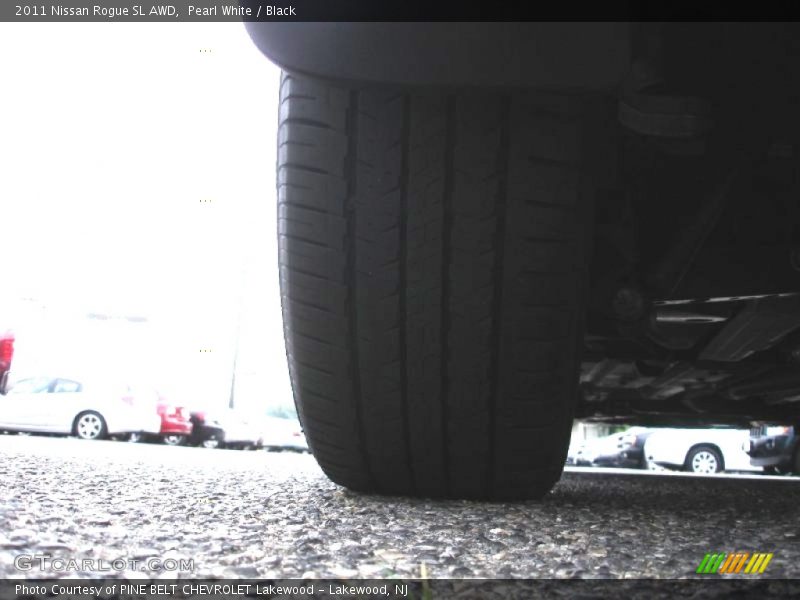 Pearl White / Black 2011 Nissan Rogue SL AWD