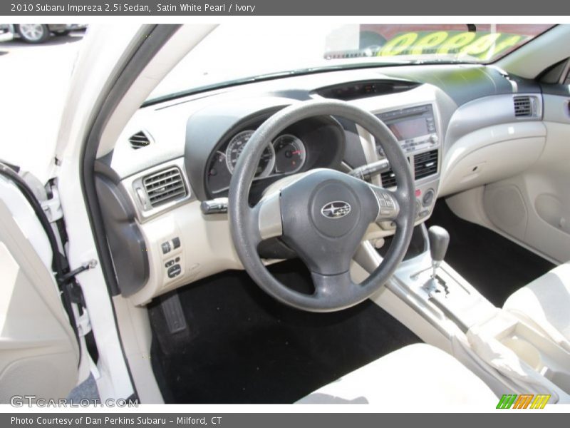 Satin White Pearl / Ivory 2010 Subaru Impreza 2.5i Sedan