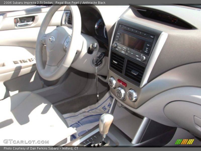 Regal Blue Pearl / Anthracite Black 2006 Subaru Impreza 2.5i Sedan