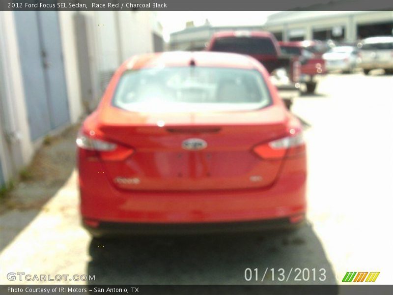 Race Red / Charcoal Black 2012 Ford Focus SEL Sedan