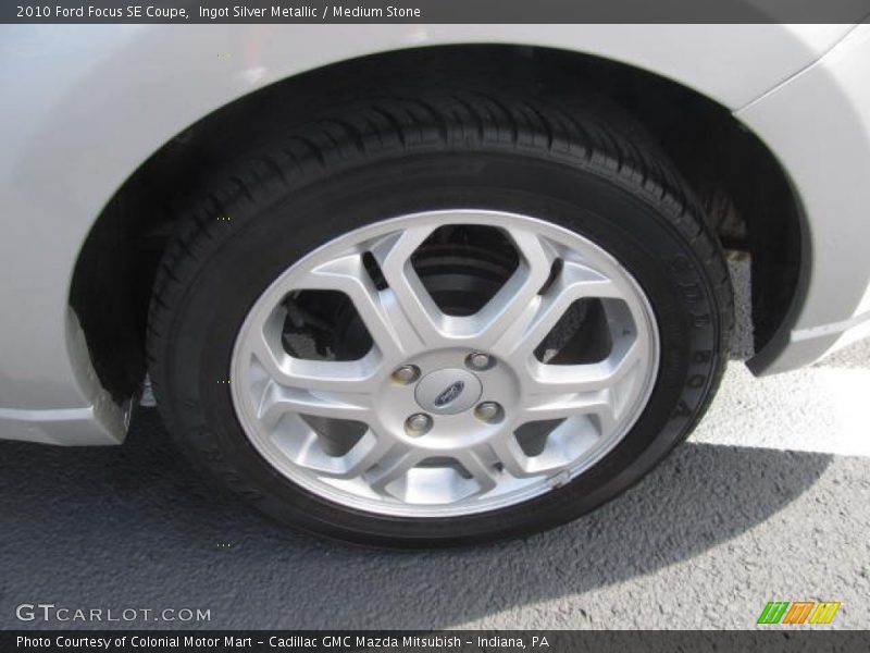 Ingot Silver Metallic / Medium Stone 2010 Ford Focus SE Coupe