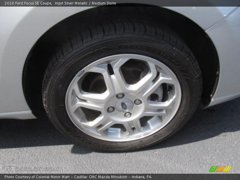 Ingot Silver Metallic / Medium Stone 2010 Ford Focus SE Coupe