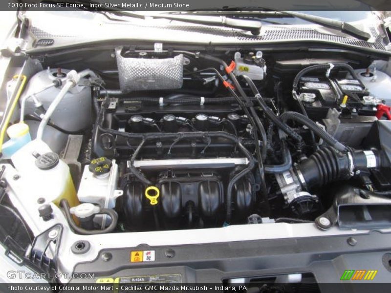 Ingot Silver Metallic / Medium Stone 2010 Ford Focus SE Coupe