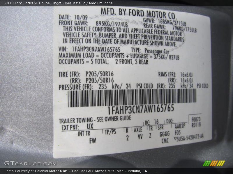 Ingot Silver Metallic / Medium Stone 2010 Ford Focus SE Coupe