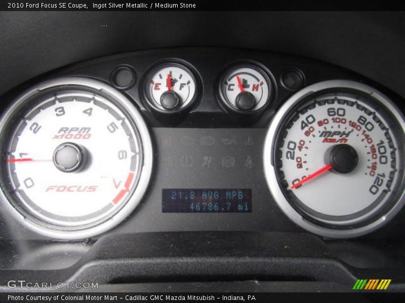 Ingot Silver Metallic / Medium Stone 2010 Ford Focus SE Coupe