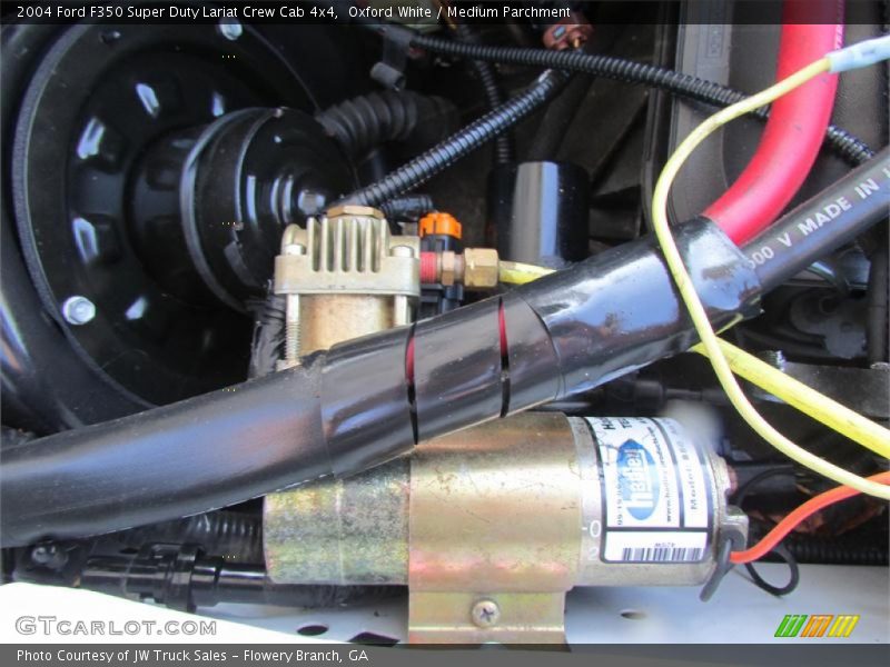 Oxford White / Medium Parchment 2004 Ford F350 Super Duty Lariat Crew Cab 4x4