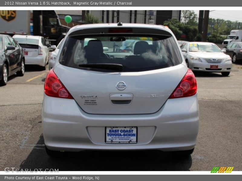 Magnetic Gray Metallic / Charcoal 2012 Nissan Versa 1.8 SL Hatchback