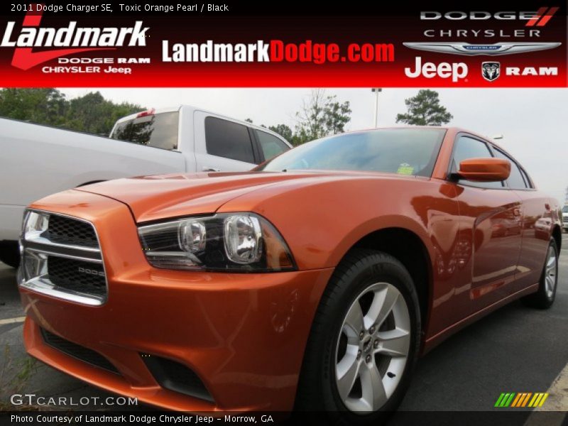 Toxic Orange Pearl / Black 2011 Dodge Charger SE