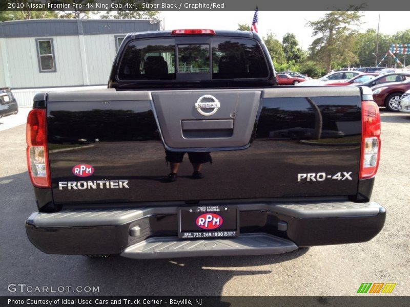 Super Black / Graphite/Red 2010 Nissan Frontier Pro-4X King Cab 4x4