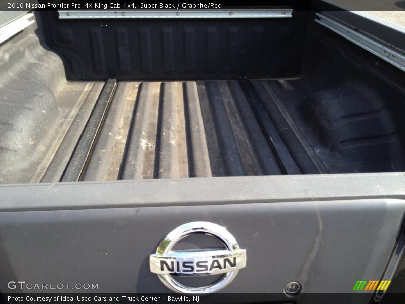 Super Black / Graphite/Red 2010 Nissan Frontier Pro-4X King Cab 4x4