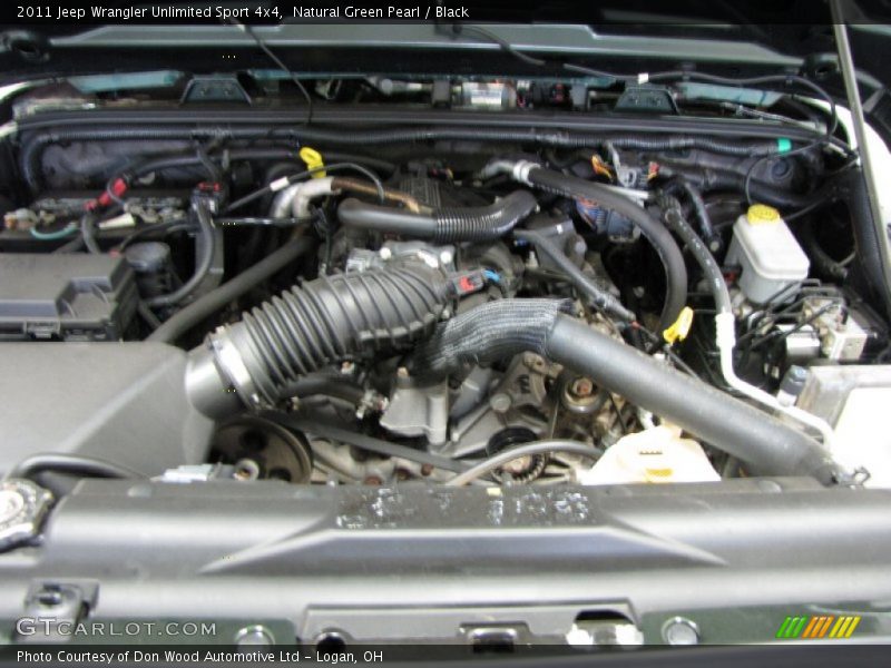 Natural Green Pearl / Black 2011 Jeep Wrangler Unlimited Sport 4x4
