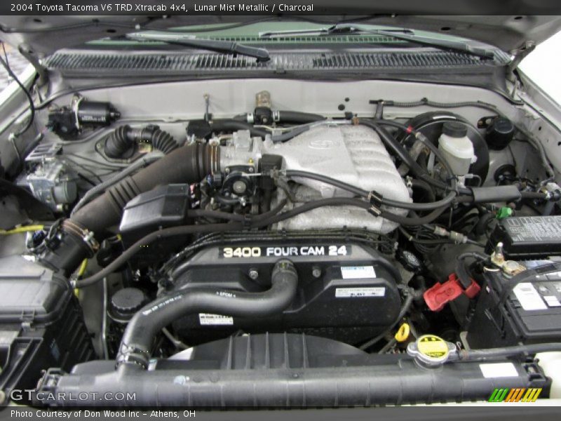 Lunar Mist Metallic / Charcoal 2004 Toyota Tacoma V6 TRD Xtracab 4x4