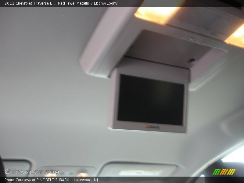 Red Jewel Metallic / Ebony/Ebony 2011 Chevrolet Traverse LT