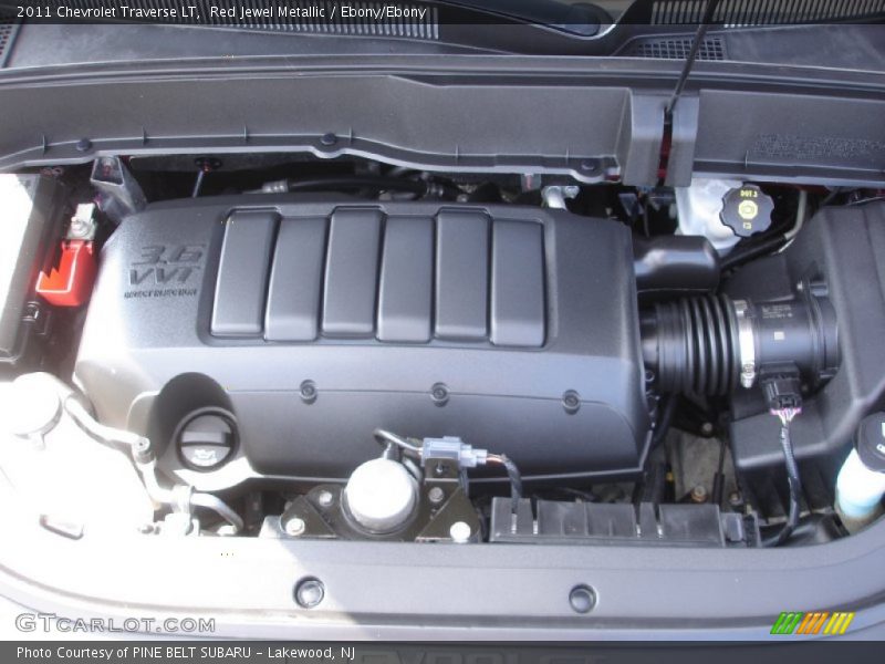 Red Jewel Metallic / Ebony/Ebony 2011 Chevrolet Traverse LT