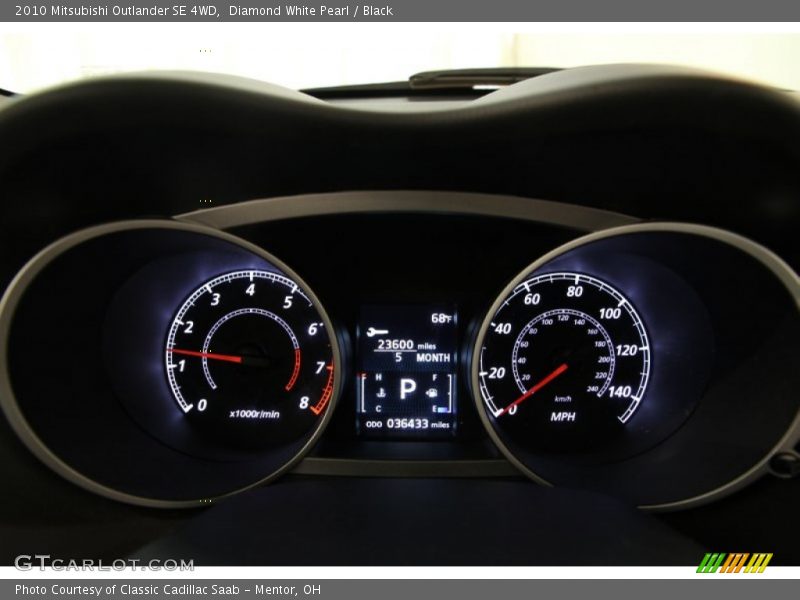 Diamond White Pearl / Black 2010 Mitsubishi Outlander SE 4WD