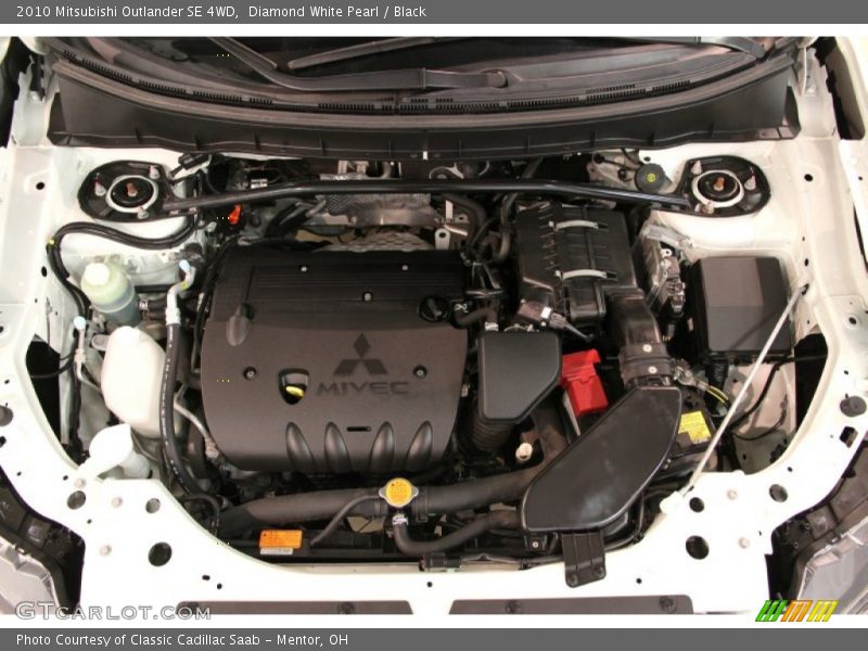 Diamond White Pearl / Black 2010 Mitsubishi Outlander SE 4WD
