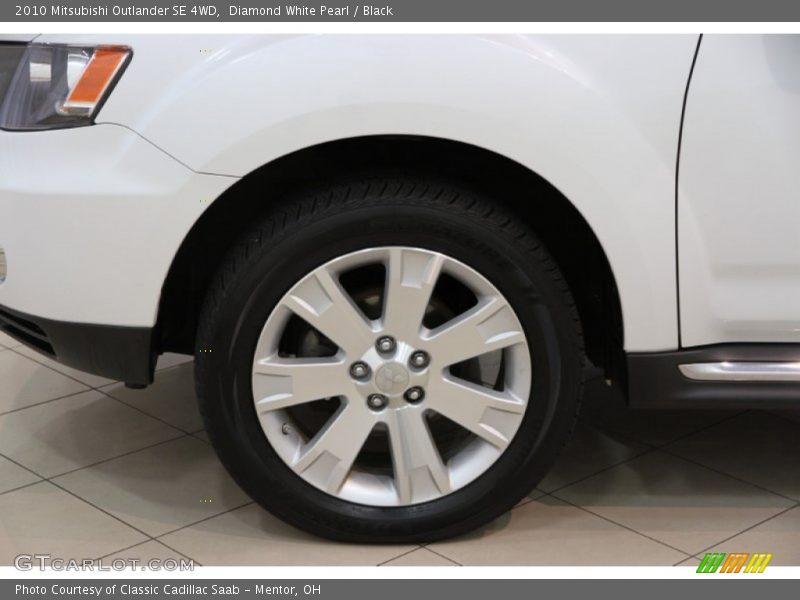 Diamond White Pearl / Black 2010 Mitsubishi Outlander SE 4WD