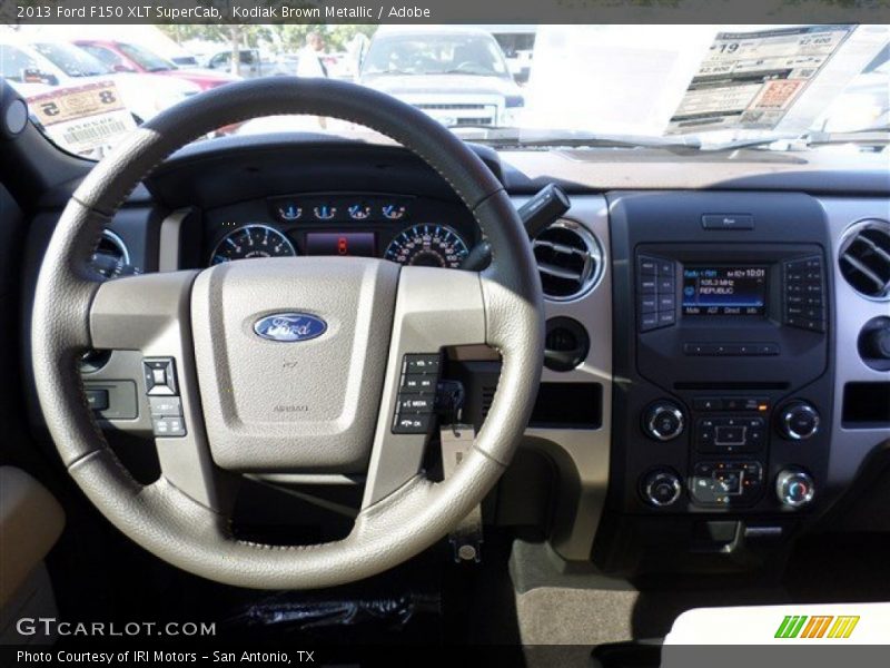 Kodiak Brown Metallic / Adobe 2013 Ford F150 XLT SuperCab
