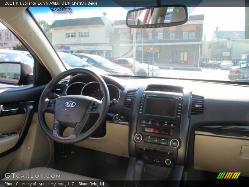 Dark Cherry / Beige 2011 Kia Sorento EX V6 AWD