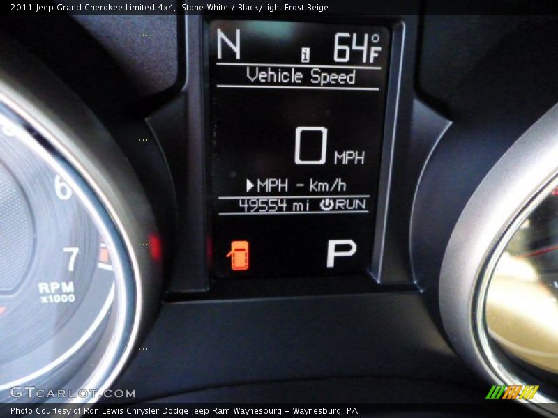 Stone White / Black/Light Frost Beige 2011 Jeep Grand Cherokee Limited 4x4
