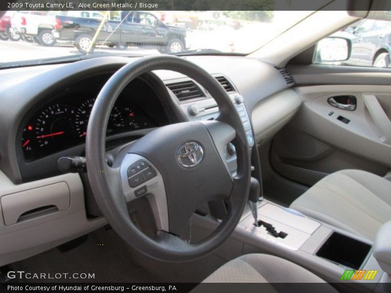 Aloe Green Metallic / Bisque 2009 Toyota Camry LE
