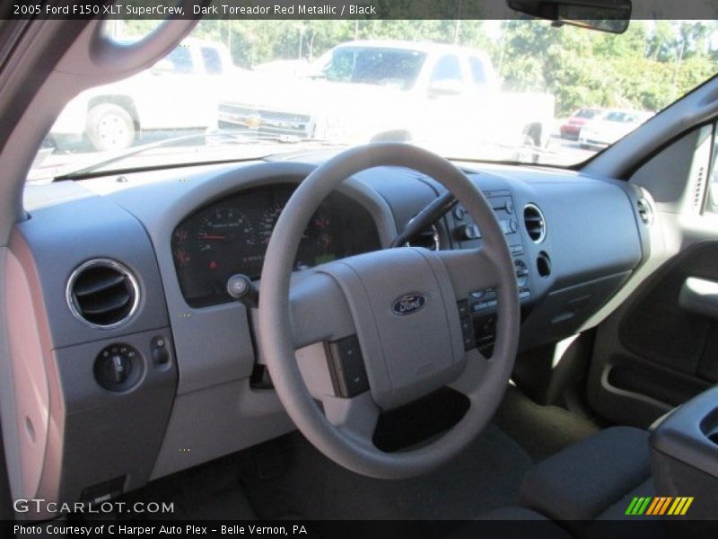 Dark Toreador Red Metallic / Black 2005 Ford F150 XLT SuperCrew