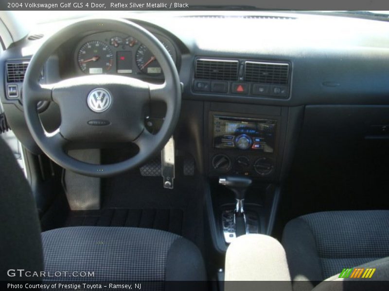 Reflex Silver Metallic / Black 2004 Volkswagen Golf GLS 4 Door