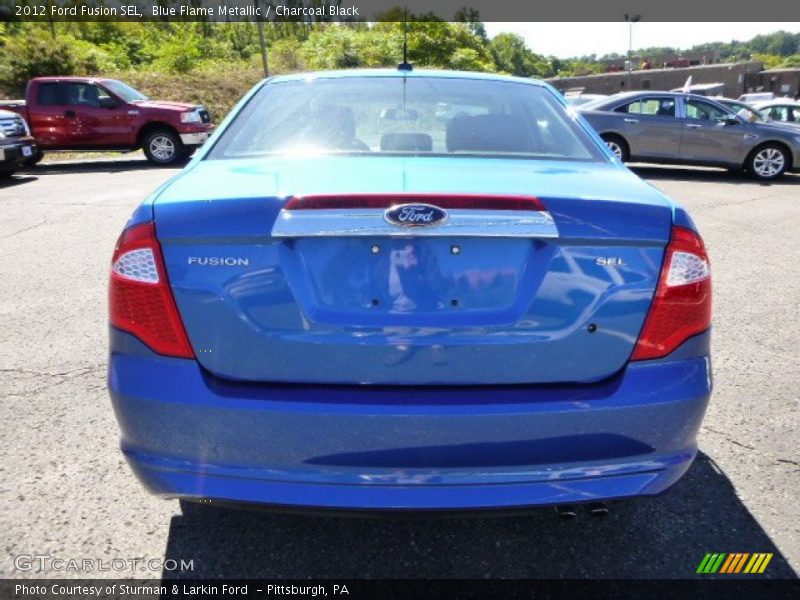 Blue Flame Metallic / Charcoal Black 2012 Ford Fusion SEL