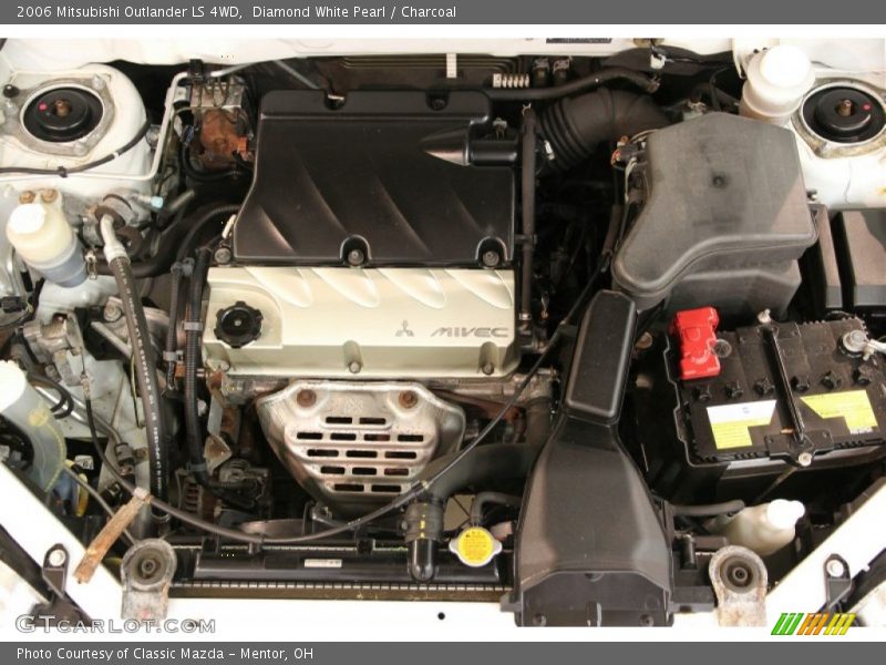 Diamond White Pearl / Charcoal 2006 Mitsubishi Outlander LS 4WD