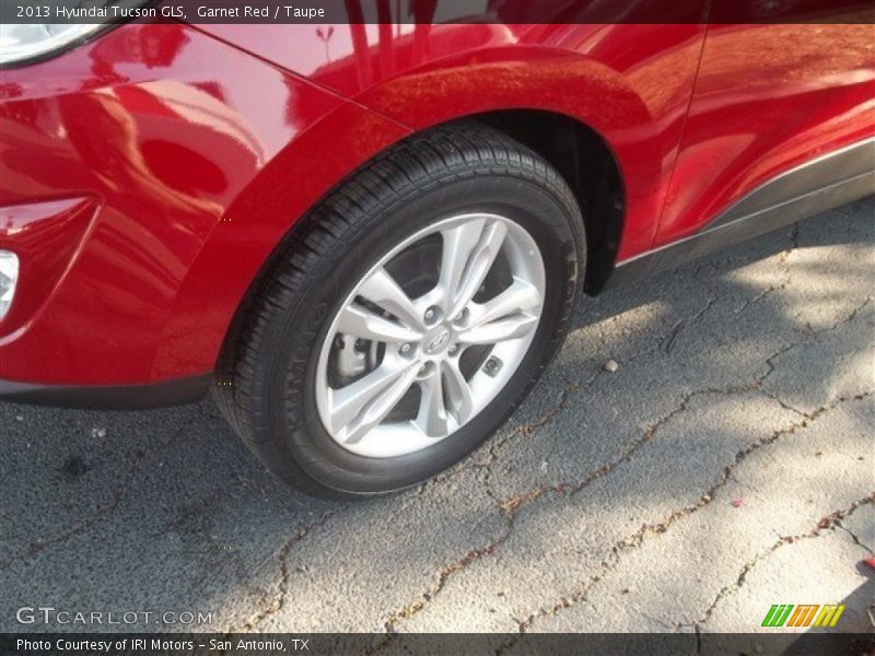 Garnet Red / Taupe 2013 Hyundai Tucson GLS