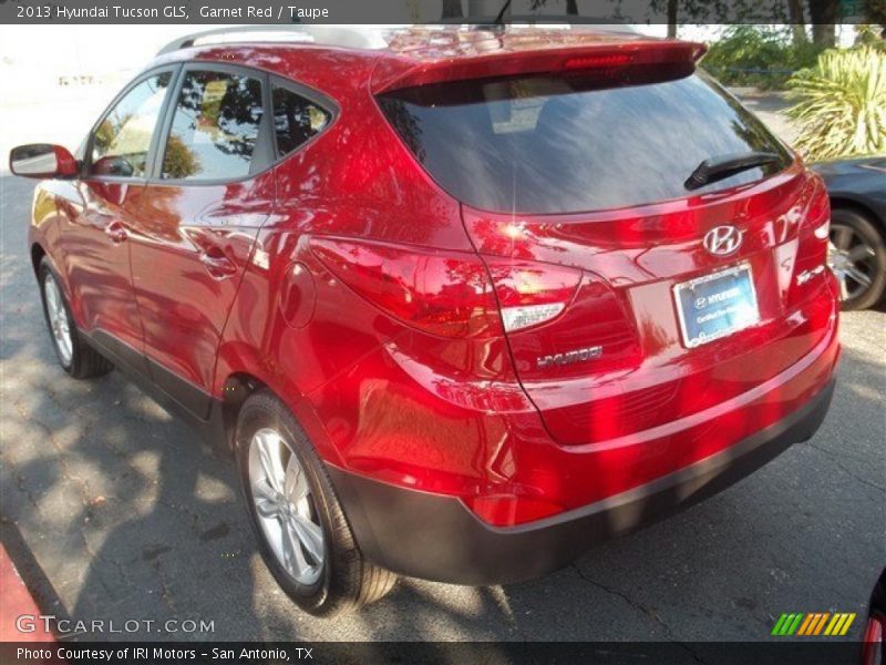 Garnet Red / Taupe 2013 Hyundai Tucson GLS